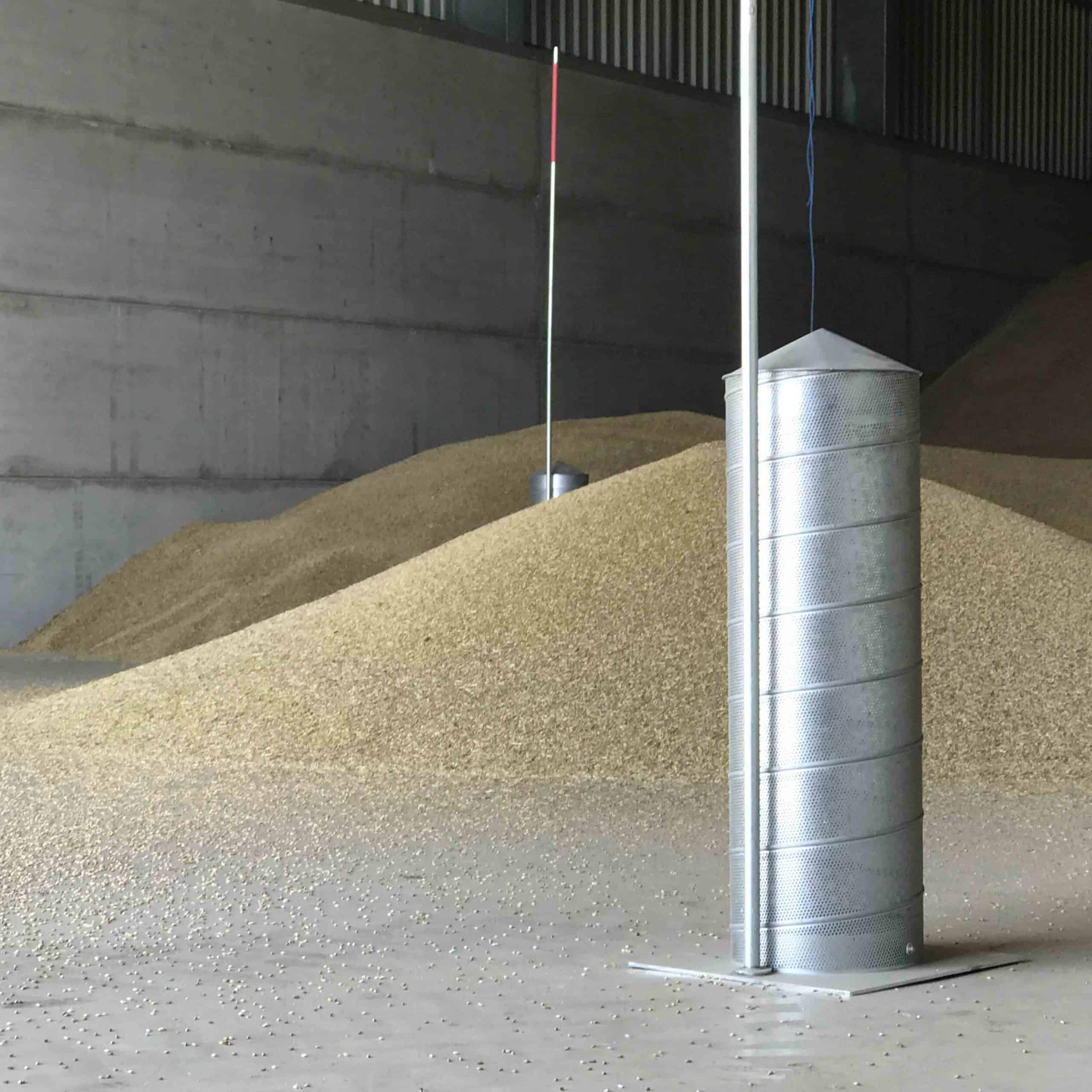 FloorVent Underfloor Grain Cooling System being loaded by an overhead conveyor