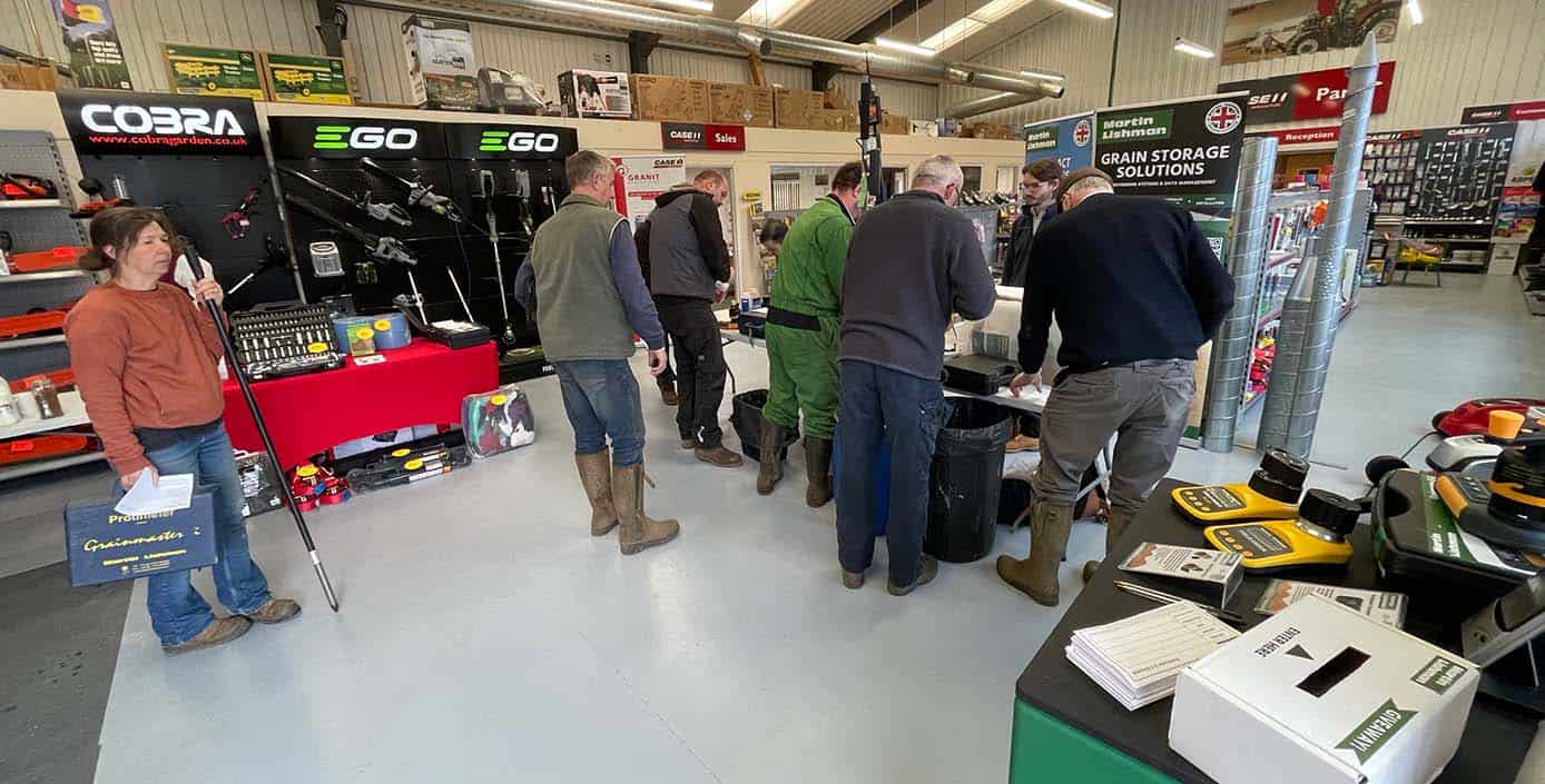 Crowds gather at the Martin Lishman Grain Clinic to test their moisture meters